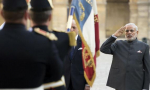 Prime Minister Narendra Modi salutes the French flag during a welcoming ceremony in the courtyard of the Hotel des Invalides in Paris, France.
