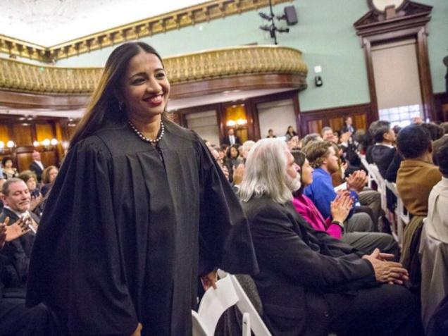 Newly appointed city judge, Chennai-born Raja Rajeswari, rises to take her place for a Judicial Swearing-In Ceremony at New York City Hall in New York on Monday.