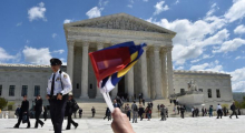 People cheer as the legal teams defending same-sex marriages leave the US Supreme Court