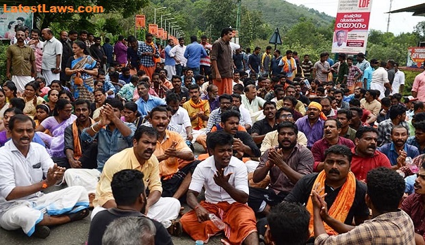 Two women attempt to enter Sabarimala temple, forced to retreat by protestors