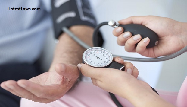 doctor-taking-patient-s-blood-pressure