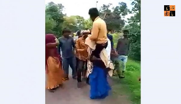 Woman carrying Husband.png, pic by indianews