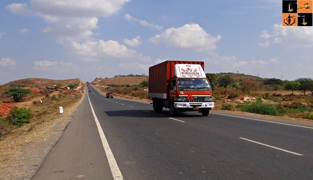 red-truck-on-highway-in-India.jpg, pic source: https://pixy.org/201755/