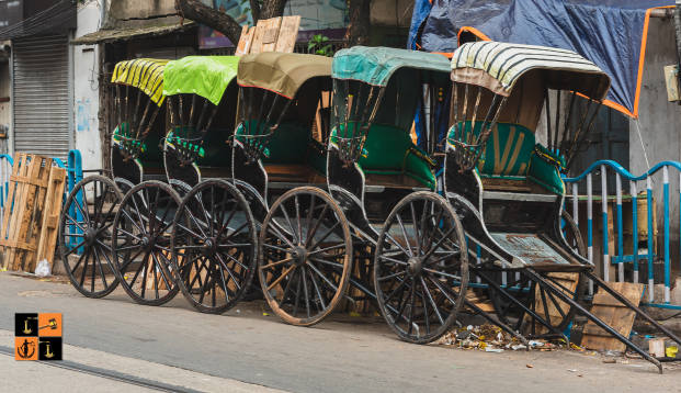 Hand pulled rickshaw.png